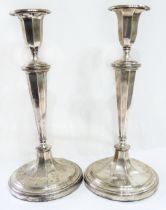 A pair of 30cm high James Deakin & Sons silver candlesticks in the Georgian style with detachable