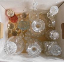 A box containing a quantity of assorted glassware including decanters, stoppers, etc.