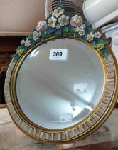 A small vintage Barbola dressing table mirror with bevelled circular plate and gilt easel back