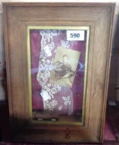 A box frame containing a Victorian style collage