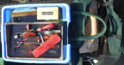A crate containing a quantity of assorted tools including hand drill, fixings, etc. - sold with a