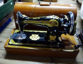 A vintage Shanghai Sewing Machine Industrial Co. sewing machine in original domed wooden case