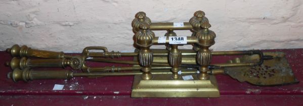 A set of old brass fire irons - sold with matching pair of fire dogs