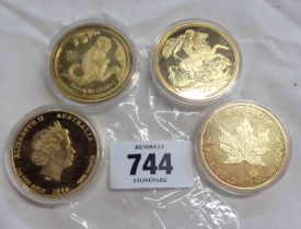 Four encapsulated gold plated collectors' coins