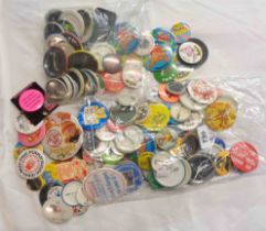 A collection of vintage and later button badges including Mr. Men, etc.