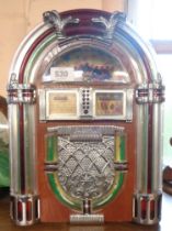 A vintage cassette player of jukebox form