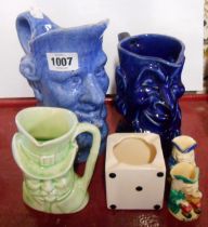A Devonmoor pottery character jug depicting Jan Stewer, a similar Happy/Grumpy face jug, a Sandygate