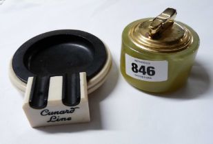 An Art Deco black and cream Bakelite ashtray made for the Cunard line - sold with a vintage onyx