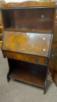 A 75cm 20th Century walnut bureau with raised shelf to back, the part fitted interior with drawer