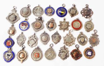 A bag containing a collection of silver and white metal sporting and other fobs, some with enamel