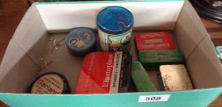 A box containing a quantity of vintage small advertising tins including stamp hinges, Elastoplast,