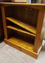 An 86cm modern pine three shelf open bookcase