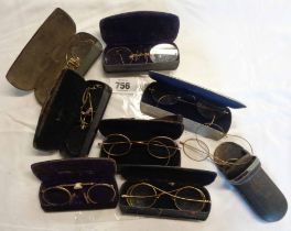A bag containing eight old gold plated spectacles, of various form, all in spectacle cases