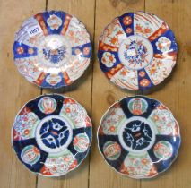 Four Japanese Imari plates with typical decoration