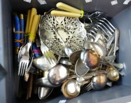 A crate containing a quantity of silver plated cutlery and other items