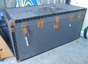 A vintage lift-top travelling trunk