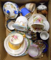 A box containing a quantity of assorted cups, saucers and other ceramics including Royal Albert,