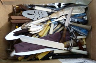 A box containing a quantity of silver plated and other assorted cutlery