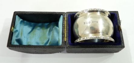 A cased Birmingham silver napkin ring - small dents