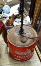 An upcycled standard lamp, made from an old gasoline tin