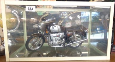 A large model BMW R90S motorcycle, set in glazed display case