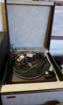 A vintage Cavalier portable record player with Garrard deck