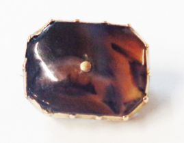 An antique yellow metal dark agate panel brooch