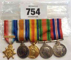 A miniature group of five medals on ribbon bar including a gilt Mons Star with '5th Aug-22nd Nov