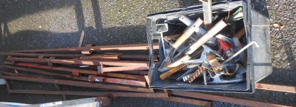 An iron market stall frame - for reassembly - sold with a quantity of associated clips