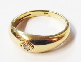 A 375 (9ct.) gold ring, set with small central diamond - size P 1/2