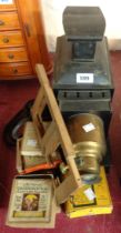 An antique magic lantern - sold with a quantity of boxed slides