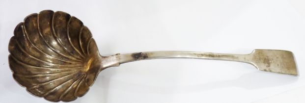 An early Victorian silver fiddle pattern soup ladle with shell pattern bowl - London 1842