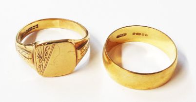 A 9ct. gold gentleman's signet ring - sold with a 9ct. gold wedding band - size W 1/2 and W