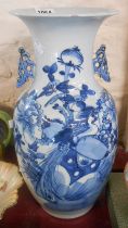 A large antique Oriental porcelain vase with pierced handles and blue painted decoration -a/f