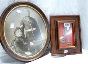 Framed military badges for the Kings Regiment and related photograph