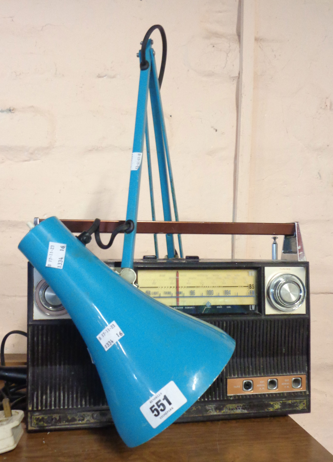 A vintage anglepoise lamp with turquoise painted finish - sold with a vintage portable transistor