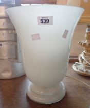 An opaque glass table lamp of vase form