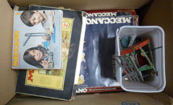 A box containing a quantity of old and vintage Meccano including part sets, etc.