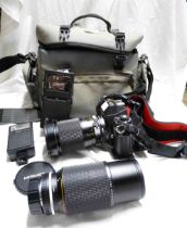 A Nikon F-301 camera outfit with Mitakon macro/telephoto lens, flash unit, etc. - in carry case