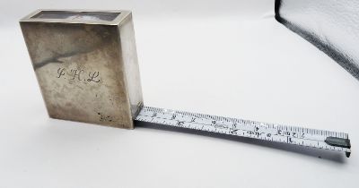 A Tiffany & Co. (Germany) marked 'Sterling' cased tape measure in inches and centimeters - with