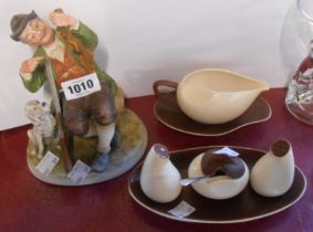 A 1950's Carltonware cruet, a similar sauce boat with stand and a Japanese porcelain figure