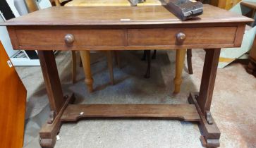 A 1.07m 19th Century mahogany side table with two frieze drawers, set on standard ends with