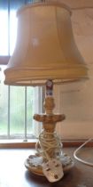 A vintage plaster table lamp and shade