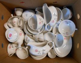 A box containing Royal Doulton bone china tea and dinner ware decorated in the Pillar Rose pattern