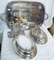 A quantity of silver plated items comprising oblong serving tray, two entree dishes and a pair of