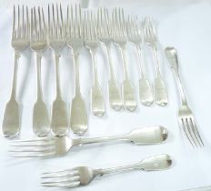 A bag containing assorted silver fiddle pattern dinner and dessert forks