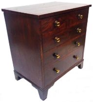 A 68cm 19th Century mahogany and cross banded chest of four long graduated drawers, set on bracket