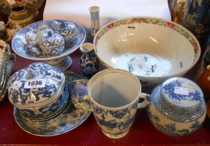 A 19th Century Chinese porcelain bowl with famille rose decoration (extensive staple repair) -