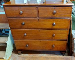 A 1.07m Victorian mahogany chest of two short and three long graduated drawers, set on turned feet