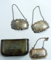 Three silver decanter labels and a silver hip flask cup base